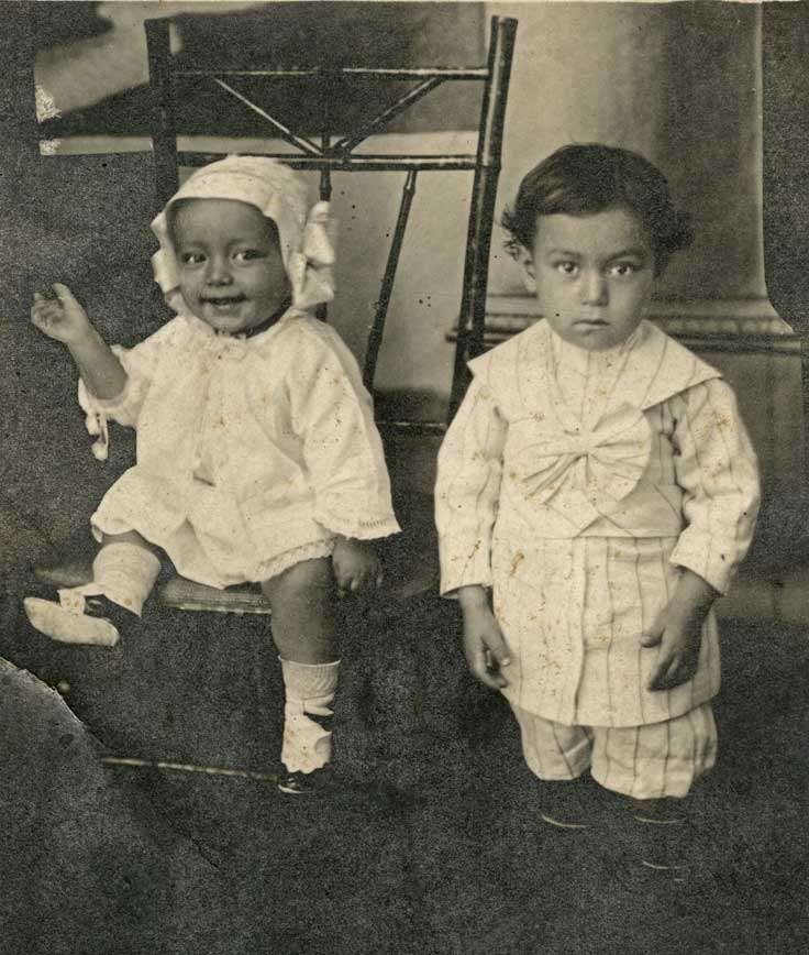 This is a photo of brothers Ignacio Jr. and Fred Maravilla. Ignacio (left) was about one year old and Fred (right) was about three. In this photo, the boys are wearing clothes their mother cut and sewed herself. 