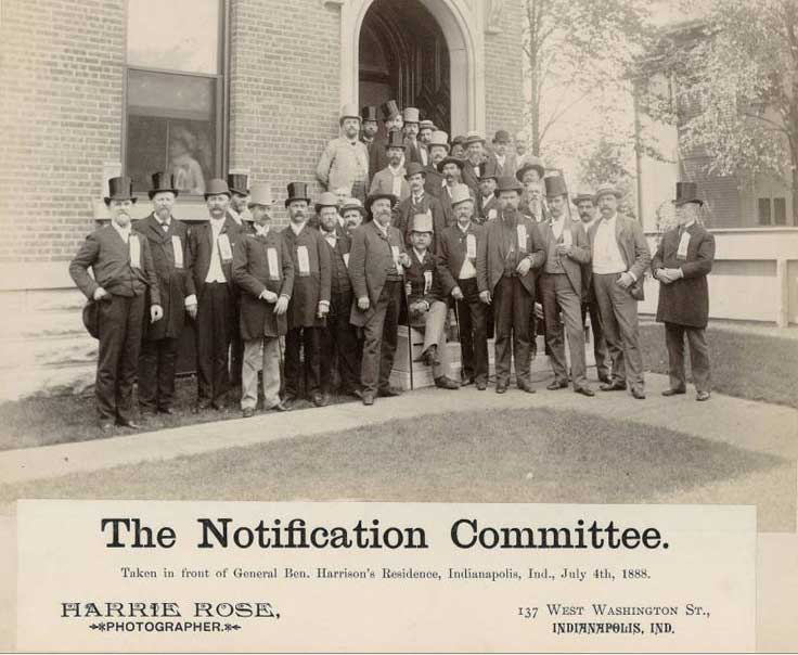 Photo of men in front of Benajmin Harrison's home on North Delware Street in Indianapolis. They are the notification committee that he was the Republican choice for presidential candidate in 1888. 