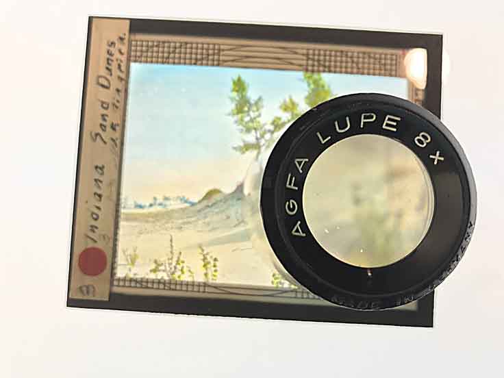 Glass lantern slide with loop - a type of magnifier. 
