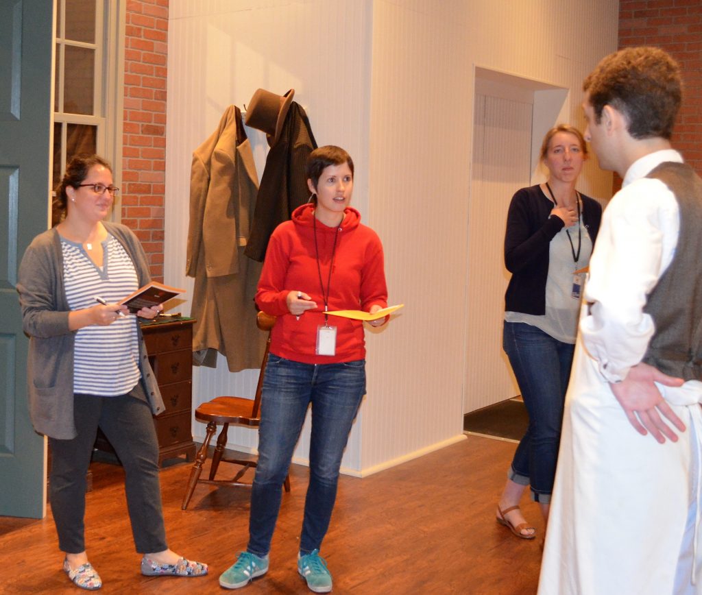 A couple of our staff members questioning a (guilty?) suspect during last year's rehearsal.
