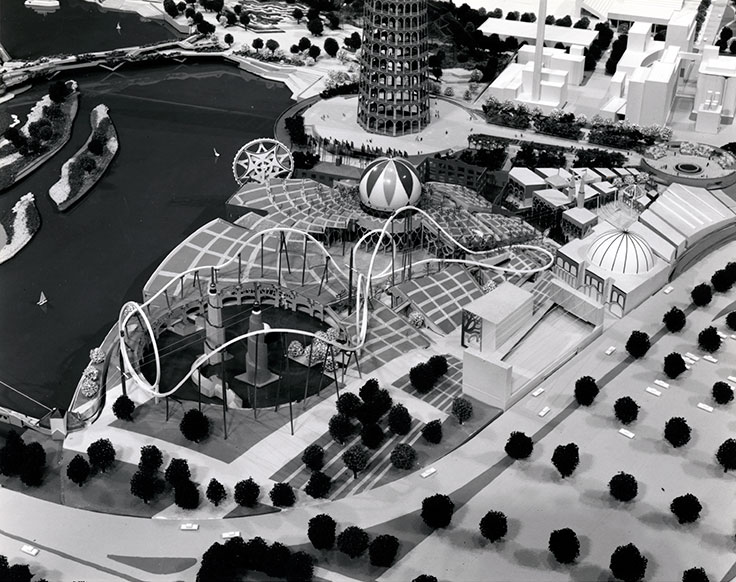 Rendering of the proposed amusement park area. The landscaped area in the foreground is a large parking lot. Behind the amusement park is the Indiana Tower and the "Grand Entry."